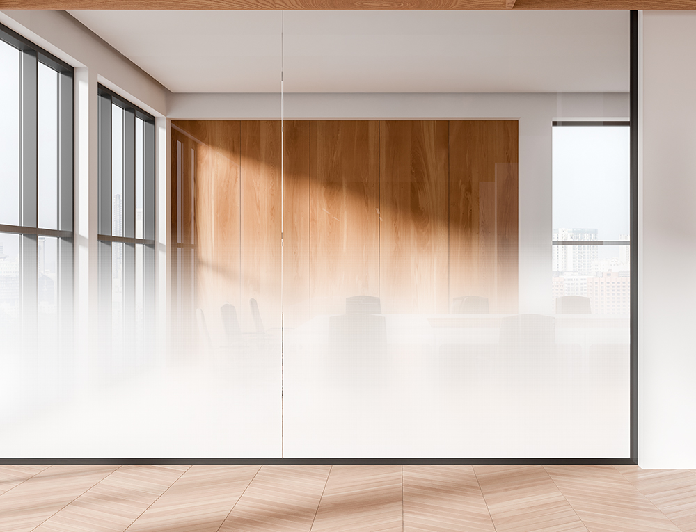Manufacturer example of a fine-dot gradient finish across a glass office partition