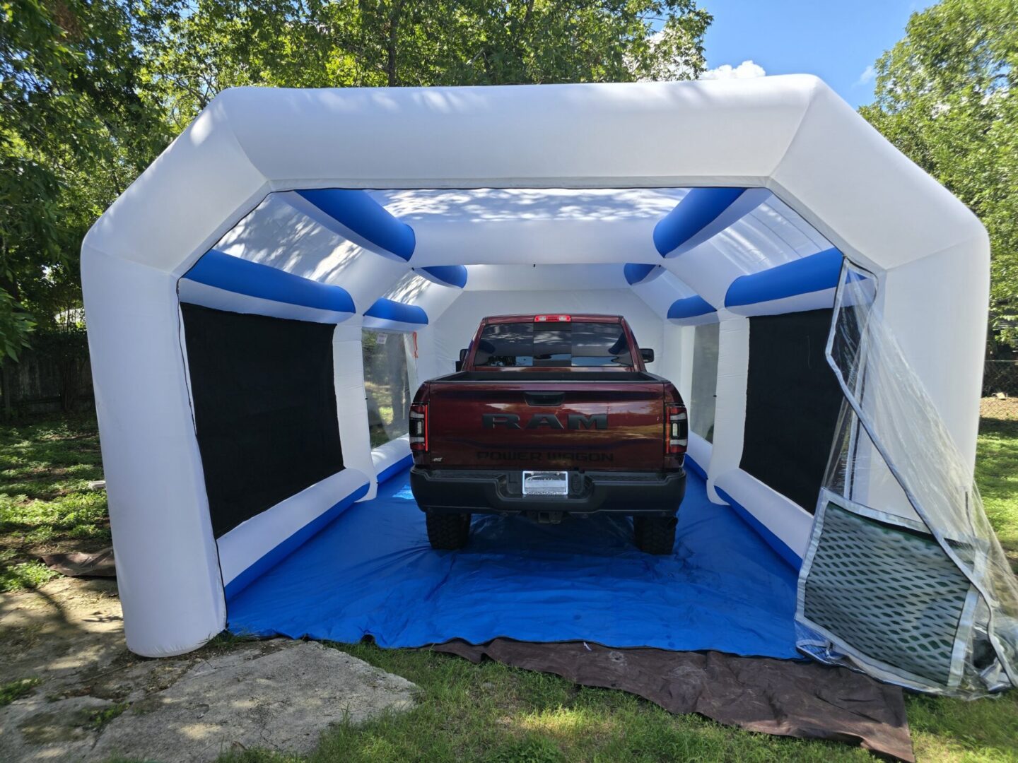 A truck in an inflatable tent